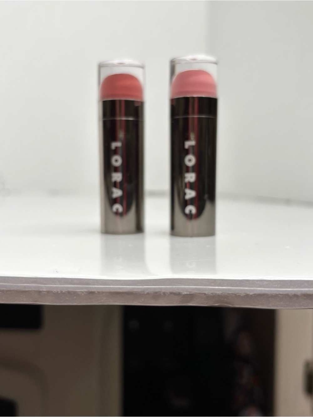 LORAC - 2 LIPSTICKS- Highly Pigmented 
Colors: OPTIMIST & CEO